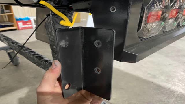<p>Fit Drivers side bracket
Notice: there is a "Scollop" cut out, this identifies the top of the bracket.</p>