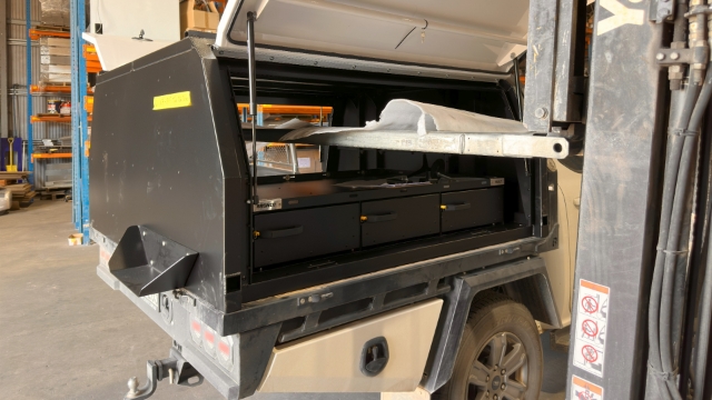 <p>use a suitable method to lift the canopy onto the tray</p>
