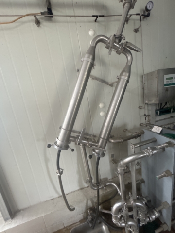 <p>use the taps to remove and replace both filter socks while the cold rinse is going through.</p><p>Do not attempt this if the hot wash is going through</p>