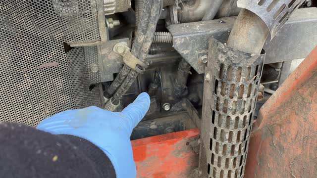 <p>Pull engine oil dip stick out.
This is located on the left hand side of the engine block.</p>