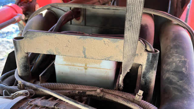 <p>Check coolant level is in between the high and low mark.</p>