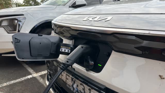 <p>Once charging has been completed or you are ready to disconnect the car from the charging cable, head to the front of the car.</p>
