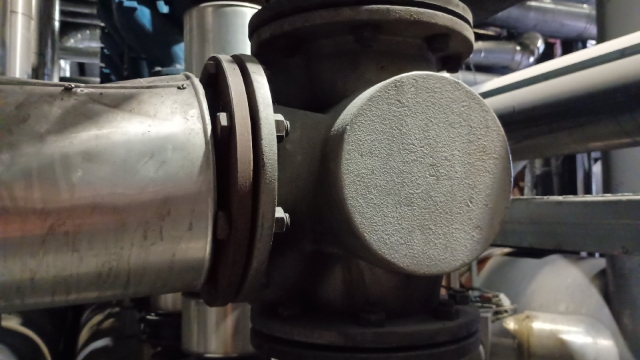 <p>Remove all nuts and bolts from the flanges on the blending valve.</p>