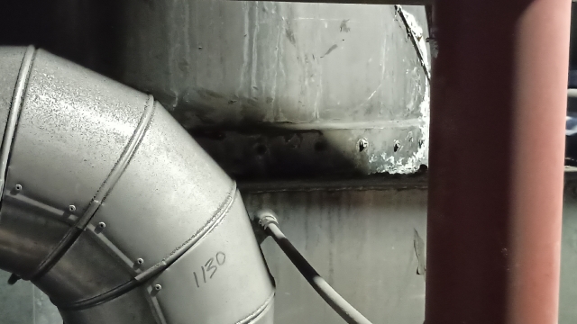 <p>Lower stack into hood and fix down with teks. Seal the join.</p>