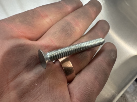 <p>Get a countersunk Huck bolt</p>