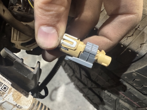 <p>Disconnect the camera plug</p>