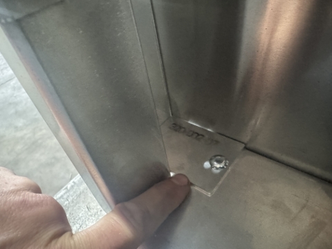 <p>Rivet in place</p>