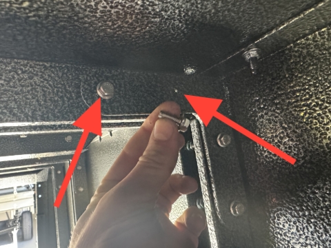 <p>Fit fasteners to the roof brackets</p>