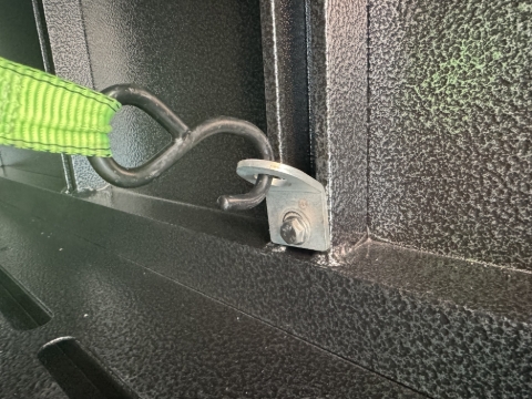 <p>Use the standard boss tiedowns and a channel nut</p>