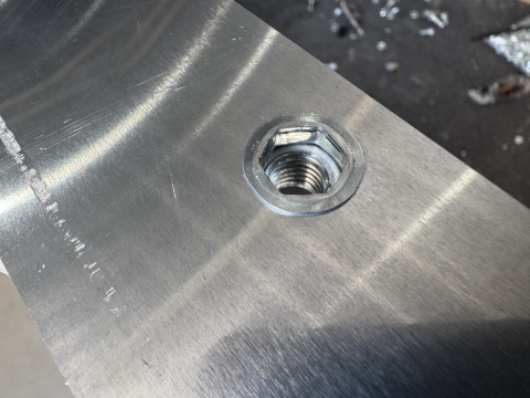 <p>Install the Rivnuts</p>