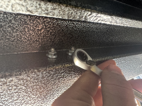 <p>Fit door and tighten nuts</p>
