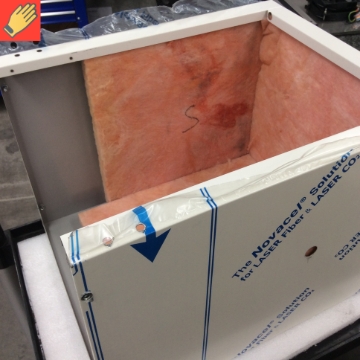 <ol><li>Place the insulation into the body.</li><li> The back wall insulation is recommended to be cut thinner.</li><li>Using a packing blanket or foam, carefully lay the incubator body on its back.</li></ol>