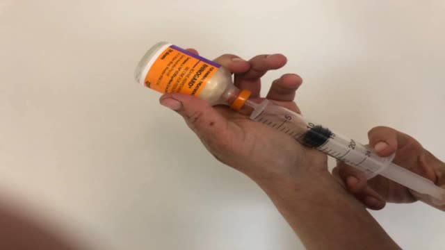 <p>Inject the saline into the freeze dried Rhinogard.</p>