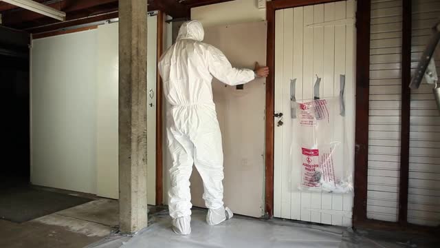 <h4>Preparing the work area</h4>
<ul>
<li>Ensure safe access to the work area.</li>
<li>Restrict access and limit people.</li>
<li>Close doors and post notices.</li>
<li>Restrict access behind asbestos board if possible.</li>
<li>Inform others of contamination.</li>
</ul>
