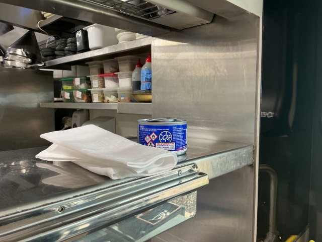 <p><span style="font-size: 16px; line-height: 1.4;">Disposal of Oz gel container </span></p><ul><li><p><span style="font-size: 16px; line-height: 1.4;">Place container on kitchen pass with cloth napkin </span></p></li><li><p><span style="font-size: 16px; line-height: 1.4;">Use cloth napkin to dispose of fondue kit in provided container at the pass </span></p></li></ul><blockquote><p><span style="font-size: 16px; line-height: 1.4;">Note: when disposing of Oz gel container, wear dishwashing gloves to triple rinse tin prior to disposal.</span></p><p><span style="font-size: 16px; line-height: 1.4;">Dispose of rinsed tin in mixed recycling.</span></p></blockquote><p></p><p></p>