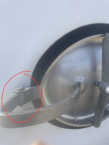 <p>Takeoff door by removing this pin. Clean inside the seal with a brush once Clean return how it was.</p>