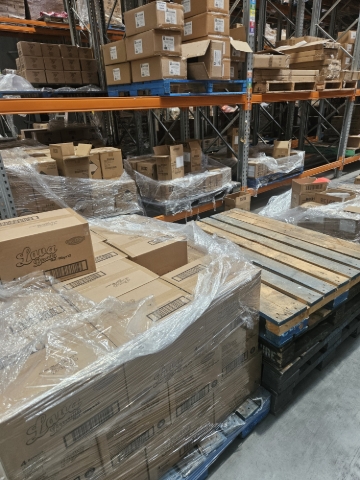 <p>Goods stored on floor but racks are empty. </p><p></p>