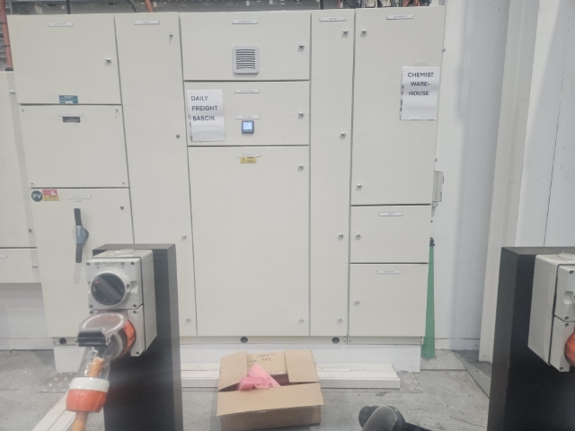 <p>Access to the electrical distribution board is blocked. </p><p>Combustible material should not be stacked in this area.</p>