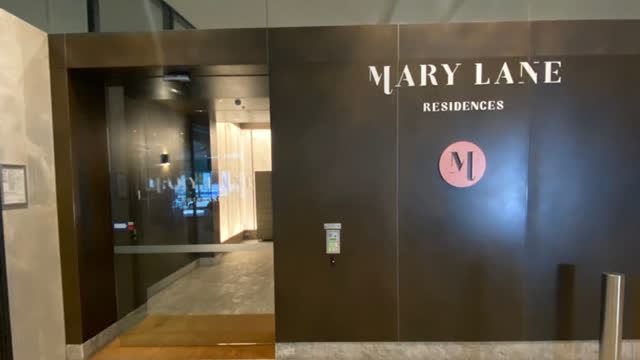 <p>The building entrance is next to the concierge desk of Westin Hotel.</p>
<p>Your apartment number is 2012, on level 20.</p>