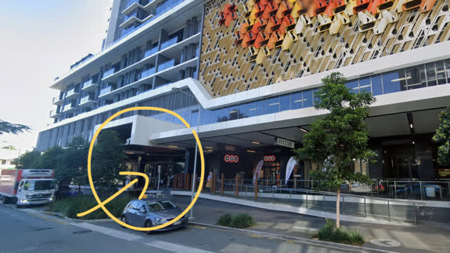 <p>The building entrance is next to BWS.</p>