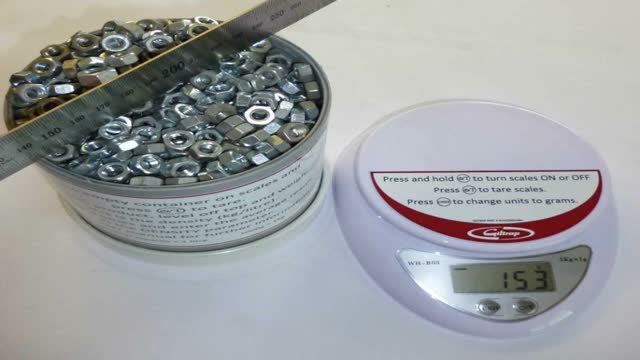 <p>Fill the cup with product, ensuring it is level with the top</p>