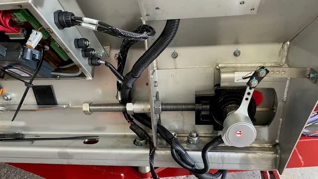 <p>Run the ISOBUS loom up to the top gland on the electronic enclosure as pictured.</p>