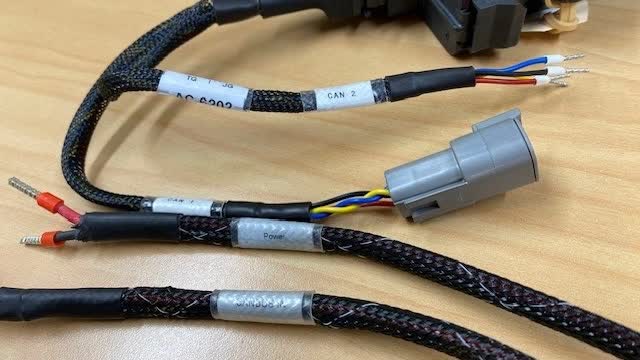 <p>Fit boot lace fitting to the POWER cable and CAN 2' fly lead as pictured.</p>