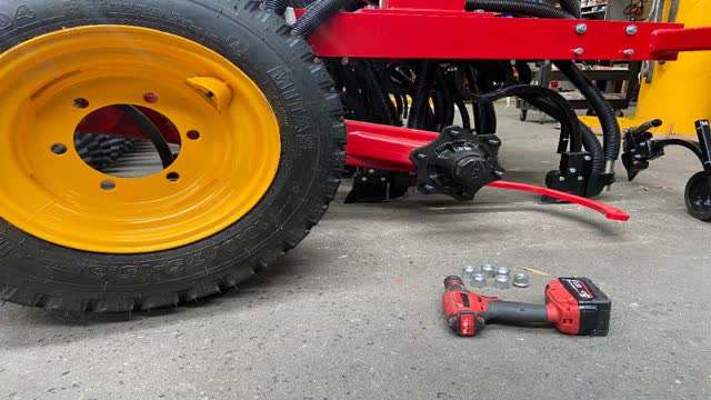 <p>Lift up MK4 corner with crane and sling and place tyre on and tighten bolts.</p>