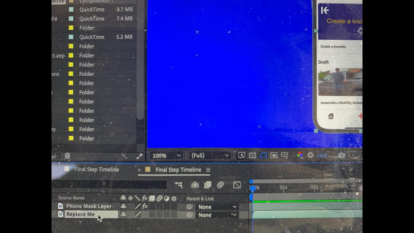 <p>There is a phone mask layer and a replace me one.
Highlight the replace me layer and delete it</p>
