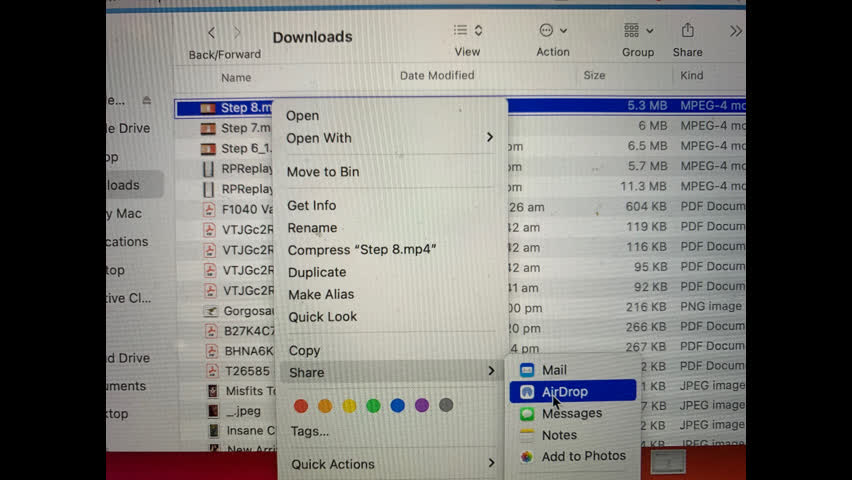 <p>Right click in downloads.
Share to airdrop.</p>
