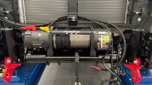 <p>Install the winch to the cradle.</p>