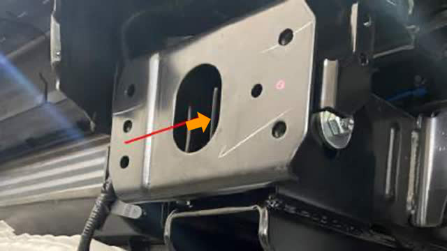 <p>Feed the crush tube and M12 bolt through the
chassis bracket and chassis.
Repeat procedure on opposite side.</p>