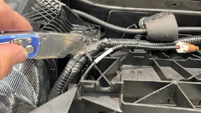 <p>Tip: We suggest carefully unpicking the camera protective harness from the main wiring loom to provide extra length.
Take extra care not to damage the
wiring loom in the process and retape once completed. This will allow for easy reconnection when fitting the bar.</p>