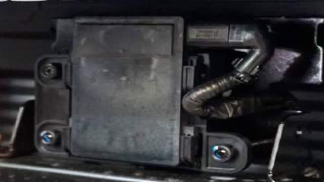 <p>If vehicle is fitted with a radar, unclip the
cover, disconnect the plug and remove the
two (2) side bolts. There is another bolt
located behind, remove this too.
Carefully remove the radar, ensuring you do not drop it.</p>