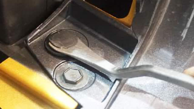 <p>Remove the three (3) clips and two (2) bolts
from the factory bumper to the radiator
support.</p>