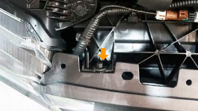 <p>Remove two (2) upper grille bolts and starting
on the outside headlight section.</p>
<p>Once unclipped, depress the lower grill clips
and gently remove the grill.</p>
<p>Store front grille in a safe place for later
reinstall.</p>