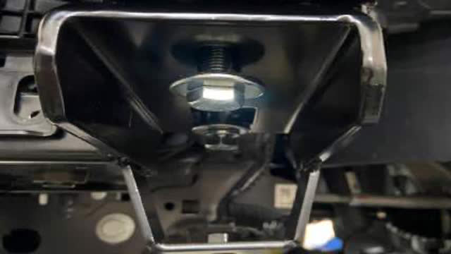 <p>Mount new lower intercooler brackets
supplied to both sides of the vehicle using
original factory hardware. Finger tighten only.</p>