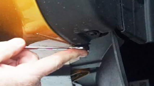 <p>Remove all factory flare clips from around the
vehicle wheel arch. Retain clips for later use.
Remove the lower retaining bolt.
Repeat procedure on opposite side.</p>