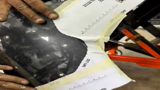 <p>Position the cutting template in place under headlight and align with guard edge and grille line.
Use the bodyline on the bumper as reference to mark the cut line on assembly as shown.</p>
