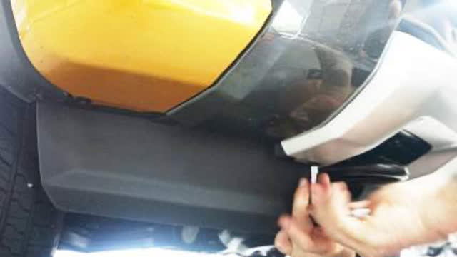 <p>Remove the bolts from the factory bumper on
the underside. There are two (2) located on
each side.
Repeat procedure on opposite side.</p>