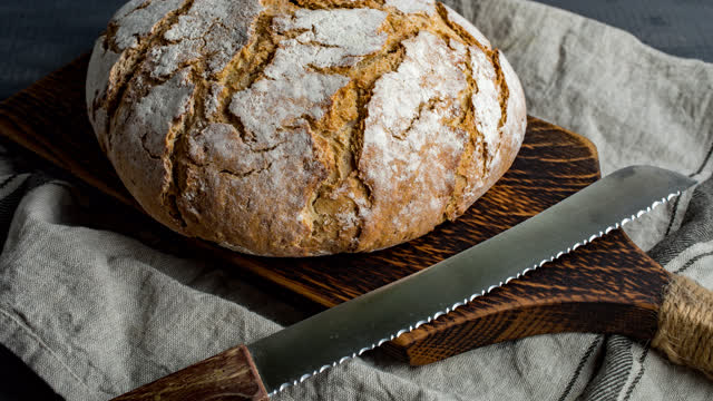 You will need: A bread knife, this is a long, straight knife with a serrated edge and quite a stiff blade.  A chopping board.  A loaf of bread to slice.