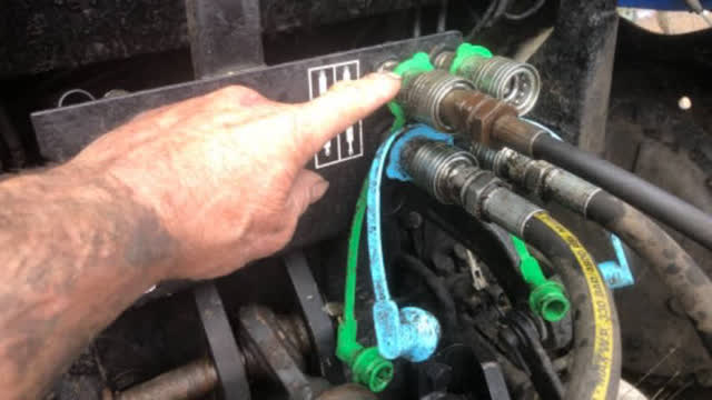 Connect the Hydraulics into left hand side green fitting