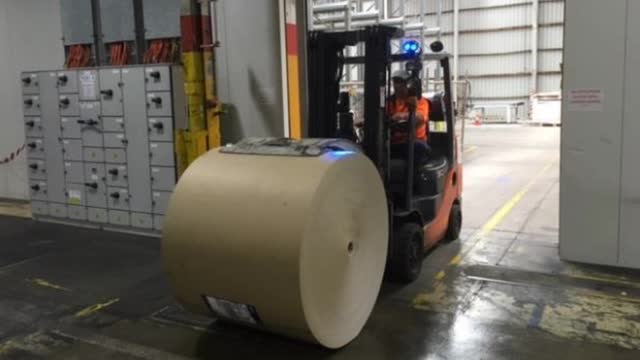 <p>A forklift will deliver the Paper Reels for both Flex Machines through the rapid roller door on the north wall between Flex 2 & Line 1.</p>