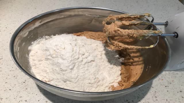 <p>Mix in flour, baking soda, baking powder and salt.</p>