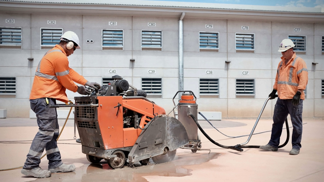 <h4>Work Practices (1)</h4>
<ul>
<li>Use routers or water jet cutters for sink and stovetop cut outs and edge or surface polishing machines for edge polishing.</li>
<li>Wet slabs before cutting, grinding or polishing to aid with dust suppression.</li>
<li>Capture all water generated from water suppressed processes through curbing and channelling.</li>
</ul>