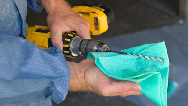 <p>Using a new wipe, wet wipe the drill bit to decontaminate it. Dispose of the wipe in an approved asbestos waste bag which is correctly labelled and is 200 µm thick.</p>