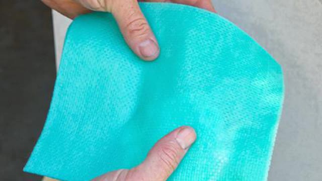 <p>Fold the wipe in half and wipe the wall down again. Folding the wipe again and re-wiping the foam and residue again leaving a clean surface, and dispose of the wipe in a approved plastic asbestos waste bag.</p>