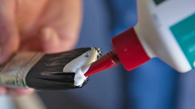 <p>Use PVA glue, paint or similar to seal the edges of the drilled hole. If a cable is to be passed through the hole, insert a sleeve to protect the inner edge of the hole from fraying when feeding in the cable.</p>