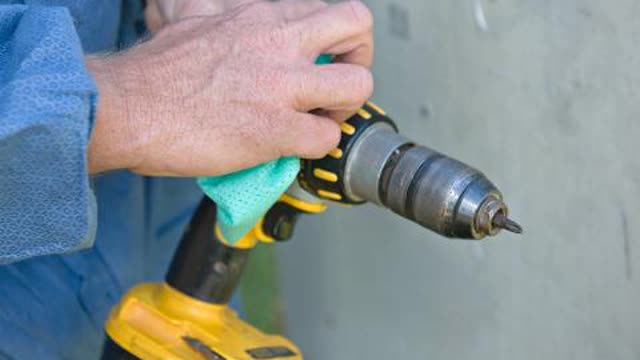 <p>Decontaminate the cordless drill using a clean wet wipe. Dispose of the wipe in an approved plastic asbestos waste bag.</p>