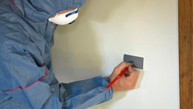 <p>Place duct tape over intended drilling point. Mark the proposed hole for drilling on the duct tape.</p>